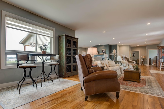 living room featuring recessed lighting and light wood-style floors