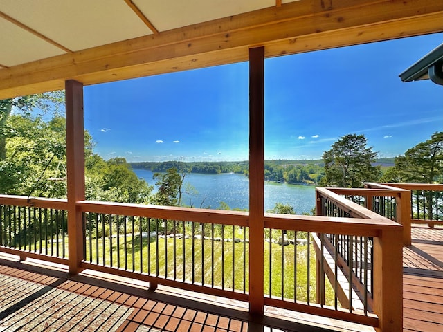 wooden deck with a water view