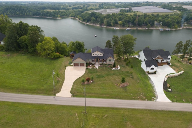 drone / aerial view with a water view