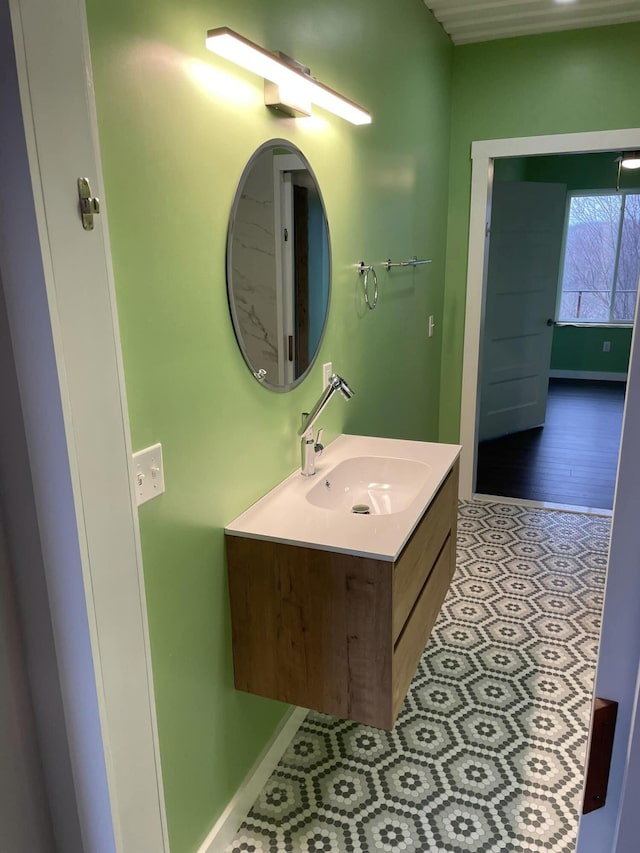 bathroom with vanity and tile patterned flooring