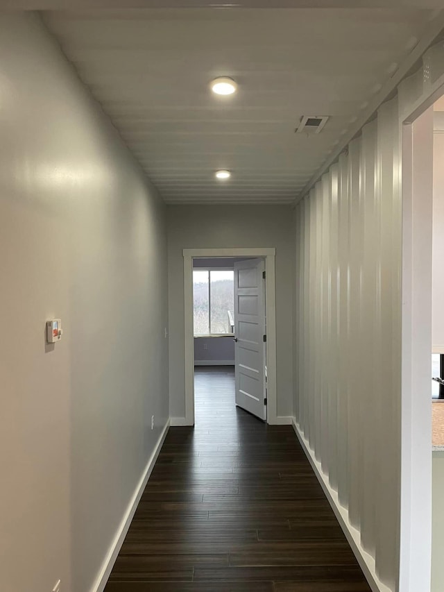 hall featuring dark wood-type flooring