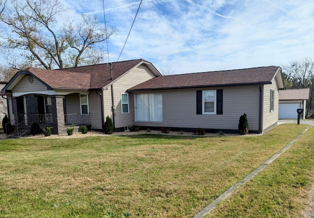 ranch-style house featuring a garage, a front yard, and a porch