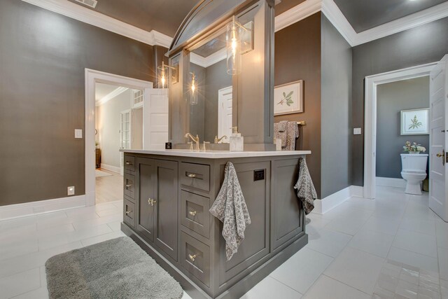 interior space with ornamental molding and light tile patterned floors