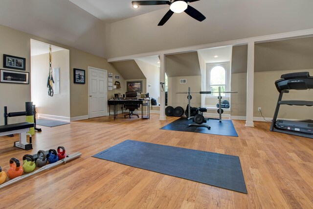 exercise room with ceiling fan and light hardwood / wood-style flooring