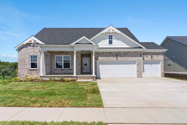 craftsman-style home with a garage and a front yard