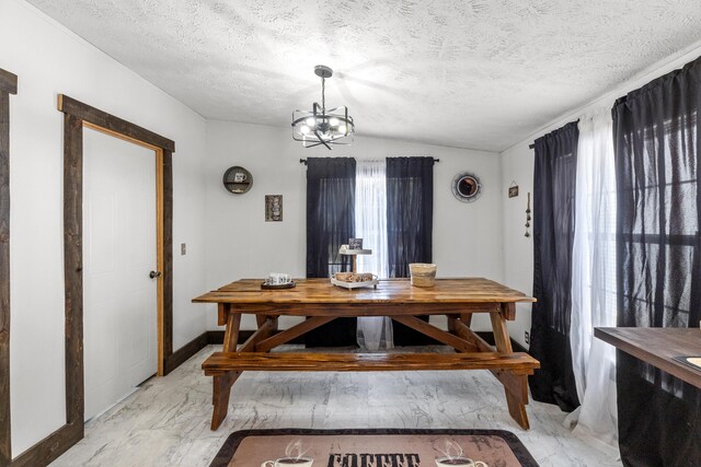 dining area with a textured ceiling, light tile patterned flooring, lofted ceiling, and a chandelier