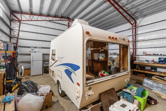 4743 Shoemaker Rdg, Zoe, KY 41397 - garage with freestanding refrigerator and metal wall