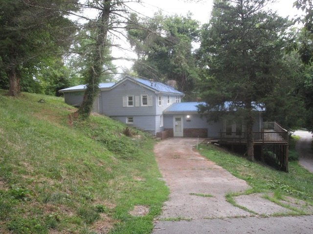 view of front of property with a wooden deck