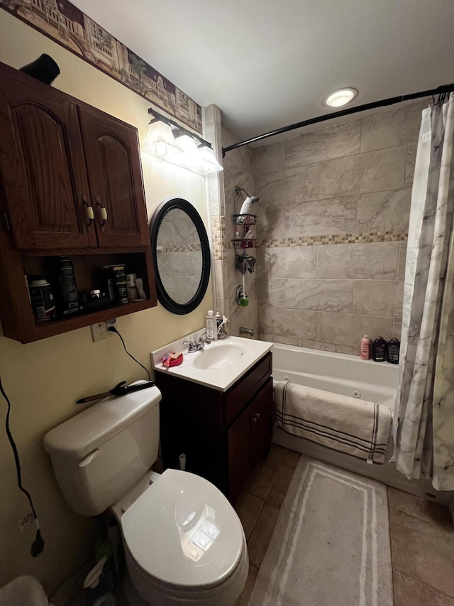 full bathroom with vanity, shower / tub combo, and toilet