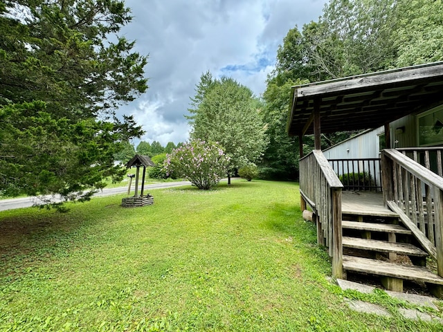 view of yard featuring a deck