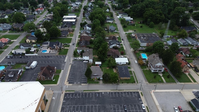 birds eye view of property with a residential view