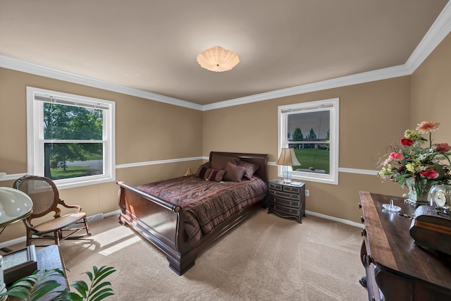 bedroom with crown molding and light colored carpet