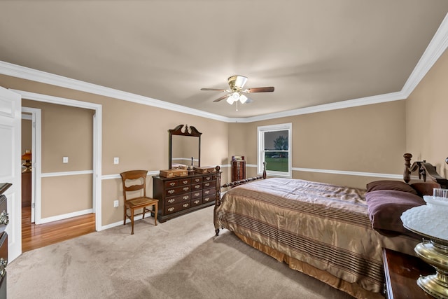 bedroom with light carpet, ceiling fan, and ornamental molding