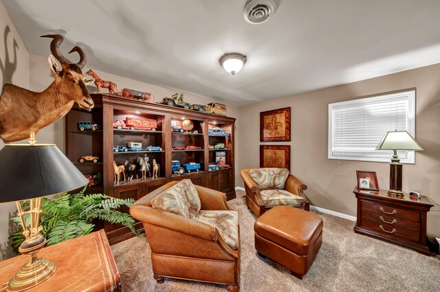 living area with carpet flooring