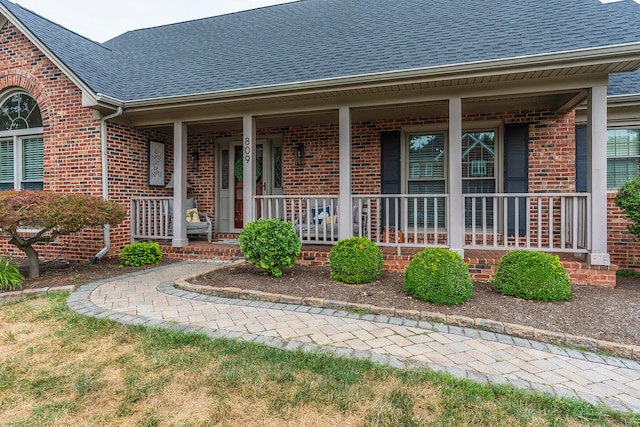 property entrance with a porch