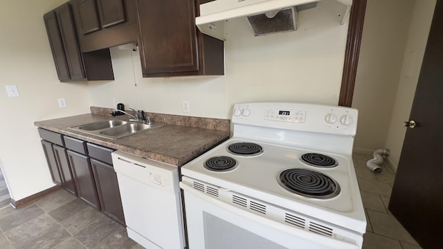 kitchen with white appliances, dark brown cabinetry, sink, and exhaust hood