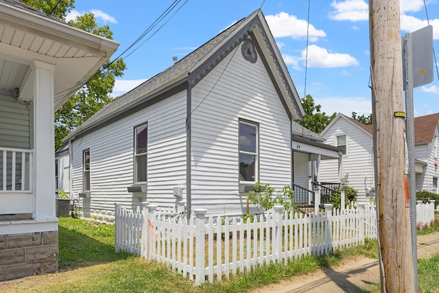 view of home's exterior with cooling unit