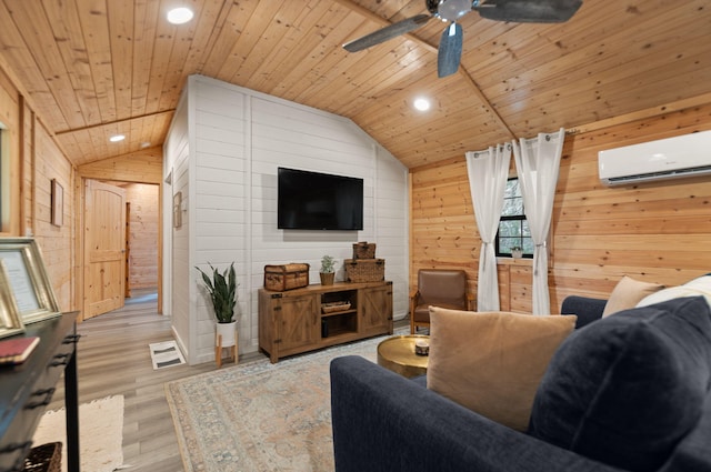 living room featuring lofted ceiling, wooden ceiling, an AC wall unit, a ceiling fan, and wood finished floors