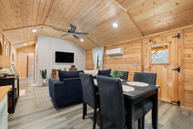 dining area with wooden ceiling, wooden walls, and light hardwood / wood-style floors