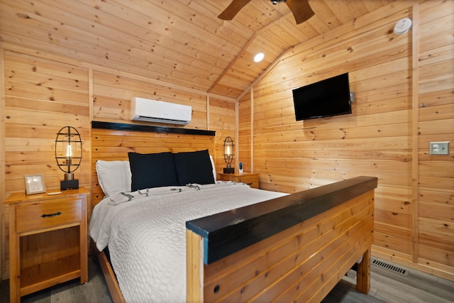 bedroom with wood-type flooring, a wall unit AC, wood walls, lofted ceiling, and wood ceiling