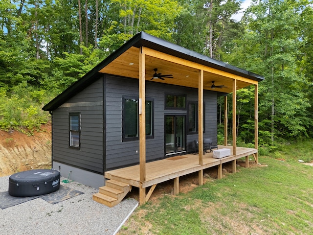 view of outbuilding with a lawn