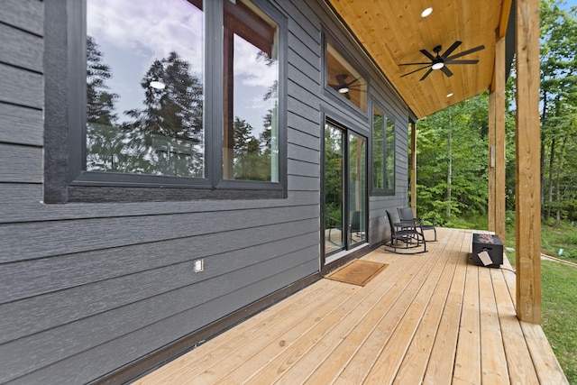 wooden terrace with ceiling fan