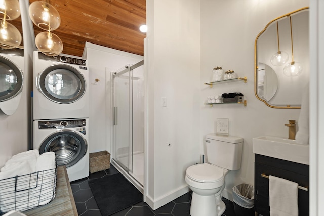 bathroom featuring stacked washer and clothes dryer, a shower with shower door, sink, toilet, and wood ceiling