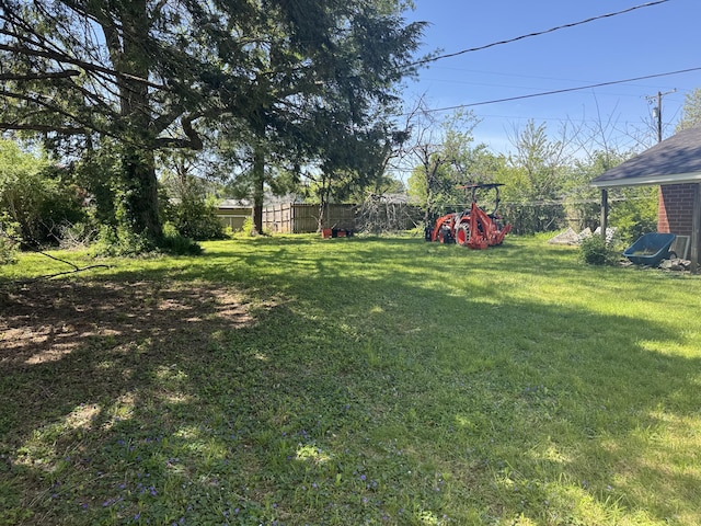 view of yard with fence