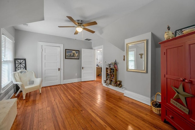 sitting room with plenty of natural light, visible vents, and light wood-style floors