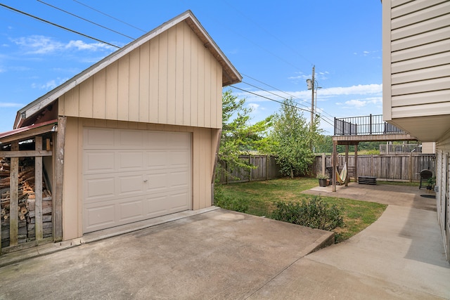 garage featuring a lawn