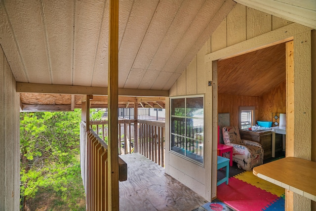 sunroom with lofted ceiling