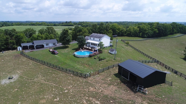 birds eye view of property featuring a rural view