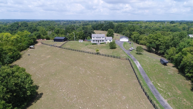 birds eye view of property featuring a rural view