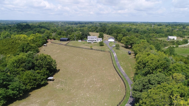 birds eye view of property featuring a rural view