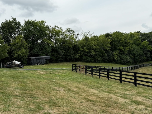 view of yard with a rural view