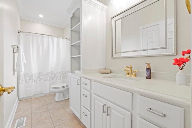 bathroom featuring vanity, crown molding, toilet, and tile patterned floors