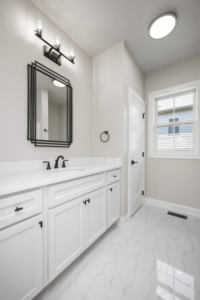 bathroom featuring vanity