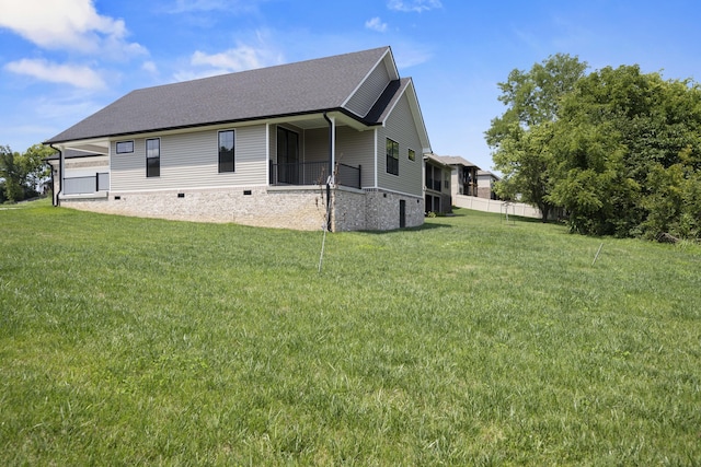 exterior space with a yard