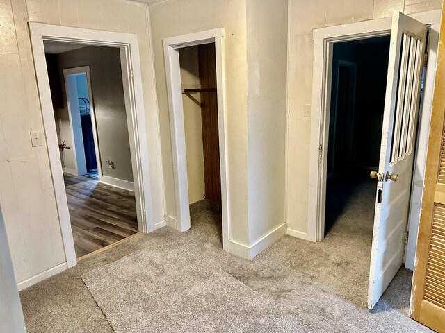 hallway featuring hardwood / wood-style flooring