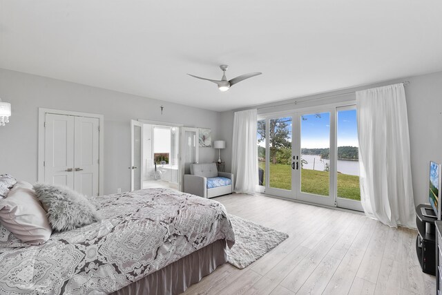 bedroom with light hardwood / wood-style flooring, multiple windows, ceiling fan, and access to exterior