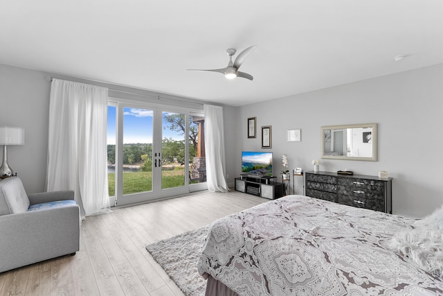 bedroom with french doors, ceiling fan, light wood-type flooring, and access to outside