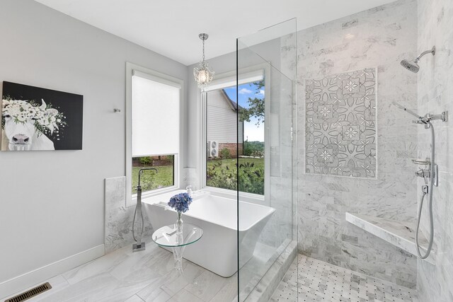 bathroom with plus walk in shower and tile patterned flooring