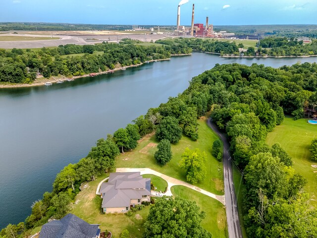 drone / aerial view with a water view