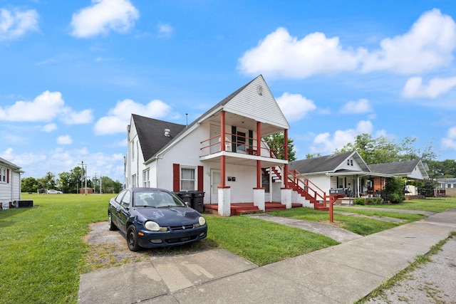 106 18th St, Corbin, KY 40701 - view of front facade featuring a porch and a front yard