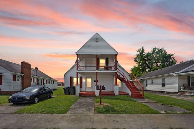 106 18th St, Corbin, KY 40701 - view of front of home featuring covered porch and a lawn