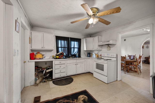 106 18th St, Corbin, KY 40701 - kitchen featuring premium range hood, light tile patterned floors, electric range, white cabinetry, and ceiling fan