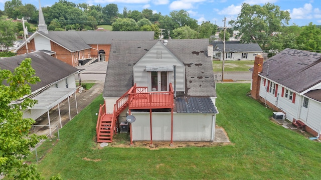 106 18th St, Corbin, KY 40701 - back of house with a yard and a wooden deck