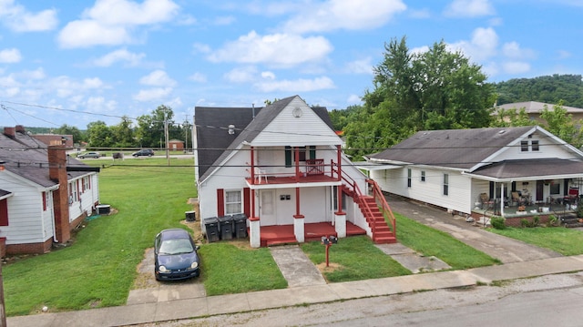 106 18th St, Corbin, KY 40701 - bungalow-style house featuring a front lawn