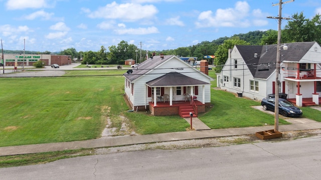 106 18th St, Corbin, KY 40701 - exterior space with a porch and a front lawn