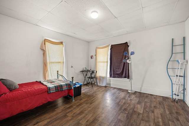 106 18th St, Corbin, KY 40701 - living room featuring wood-type flooring and a paneled ceiling